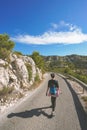 Hikers are walking on the pathway to the national park of the calanques of Marseille, Provence region. There are very beaut