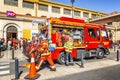 Marseille, France, 08/10/2019: Firefighters at the city`s railway station. Evacuated passengers are waiting on the street