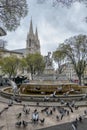 Nice square with pigeons and the Saint-Vicent de Paul church in the background, in Marseille, Royalty Free Stock Photo