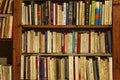 Marseille, France, 10/07/2019: Rows of old books on shelves in a store. Close-up