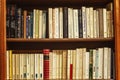 Marseille, France, 10/07/2019: Rows of old books on shelves in a store. Close-up