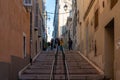 Marseille, Provence, France - Stairs between rows of yellow houses in old town