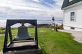 Marshall Point Light as seen from the rocky coast of Port Clyde, Maine. Royalty Free Stock Photo