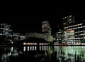 Marshall Wall View To The South Dock And The Brightly Lit Bank Towers In Canary Wharf London England At Night Royalty Free Stock Photo