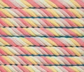 Marshmallow background. Sweet candy colorful texture. Rainbow colored marshmallow twists. Royalty Free Stock Photo