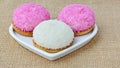 Marshmallow biscuits with pink sugar sprinkles and shredded coconut