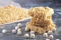 Marshmallow Crispy Rice Cereal Treat Bars on a Wooden Table Royalty Free Stock Photo