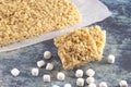 Marshmallow Crispy Rice Cereal Treat Bars on a Wooden Table Royalty Free Stock Photo