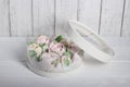 Marshmallow flowers. Marshmallows in the box. Homemade marshmallows. A white hatbox.