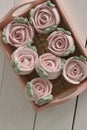 Marshmallow flowers on trays. Homemade zephyr. Close-up. View from above