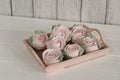 Marshmallow flowers on trays. Homemade zephyr