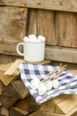 Marshmallow on wooden sticks for frying on an open fire. Rustic style, selective focus.