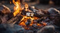 Marshmallows roasting over a campfire with glowing flames and rustic stones surrounding the fire Royalty Free Stock Photo
