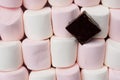 Marshmallows With Slab Chocolate Background