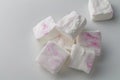 Marshmallows on white - stack of custom made white and pink marshmallow candies isolated - top view image Royalty Free Stock Photo