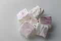 Marshmallows on white - stack of custom made white and pink marshmallow candies isolated - top view Royalty Free Stock Photo
