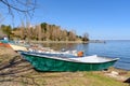 fishing boat on beach at the village of Marta, Bolsena lake, Italy