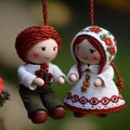 martenitsa dolls made from red and white yarn in traditional Bulgarian attire. Male and female dolls called Pizho and Royalty Free Stock Photo