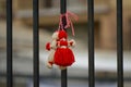 Martenitsa on a metal door.  brings luck. Best wallpaper Royalty Free Stock Photo