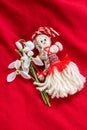 Martenitsa - traditional Bulgarian custom - red background with snowdrops Royalty Free Stock Photo