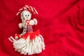 Martenitsa - traditional Bulgarian custom - red background with snowdrops