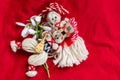 Martenitsa - traditional Bulgarian custom - red background with snowdrops