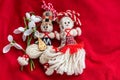 Martenitsa - traditional Bulgarian custom - red background with snowdrops