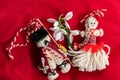 Martenitsa - traditional Bulgarian custom - red background with snowdrops