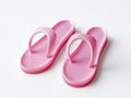 Summer Nostalgia: A Pop of Pink Flip-Flops against Pure White