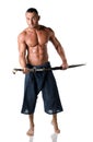 Martial art man: muscular man with kimono trousers and sword