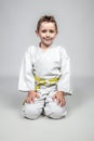 Martial arts child sitting Royalty Free Stock Photo