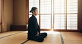 Martial arts man, meditation and exercise in Japanese dojo with mindfulness, zen or chakra balance in morning. Fighter Royalty Free Stock Photo