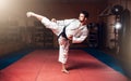 Martial arts, man in white kimono with black belt Royalty Free Stock Photo