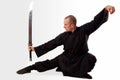Martial arts teacher with sword