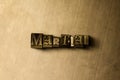 MARTIAL - close-up of grungy vintage typeset word on metal backdrop
