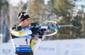 Martin Fourcade (FRA) ) on a firing line