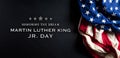 Martin Luther King Day anniversary concept. American flag against black wooden background Royalty Free Stock Photo