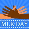 Martin Luther King Day. Multicolored hands reach for a handshake. Blue background with rays, event name, stars