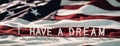 Martin Luther King Jr. Day background. I Have A Dream - small letters on US Flag