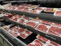 Walmart retail grocery store interior rows of red meat