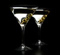 Martini cocktails with olives isolated on black Royalty Free Stock Photo