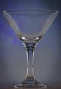 Martini Glass with dark blue lights on background