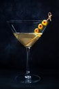 Martini. A glass of dirty martini cocktail with vermouth and olives, aperitif Royalty Free Stock Photo