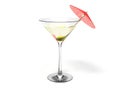 Martini glass with green olive and red coctail umbrella Royalty Free Stock Photo