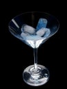 Martini glass with ice isolated on black Royalty Free Stock Photo
