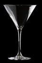 Martini glass isolated on a black background. Royalty Free Stock Photo