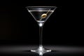 Martini glass with olive on a black background with backlight Royalty Free Stock Photo