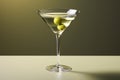 Martini glass with olive on a green background Royalty Free Stock Photo