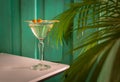 martini glass with olive on top close-up Royalty Free Stock Photo