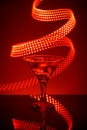 Martini glass on a red background Royalty Free Stock Photo